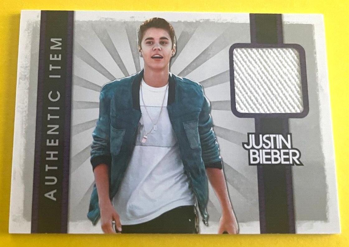 2012 PANINI JUSTIN BIEBER COLLECTION AUTHENTIC EVENT WORN ITEM JUSTIN BIEBER #17